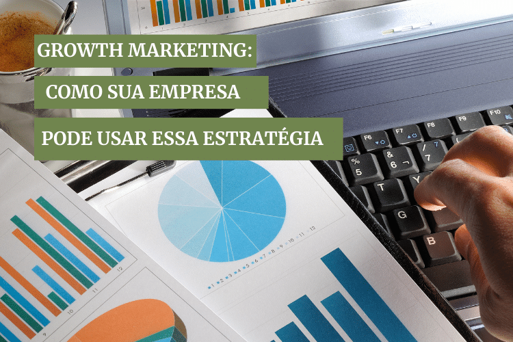 Folhas com diversos gráficos ao lado de um notebook preto, em cima da mesa